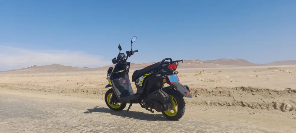 Riding a scooter through the Paracas National Reserve circuit
